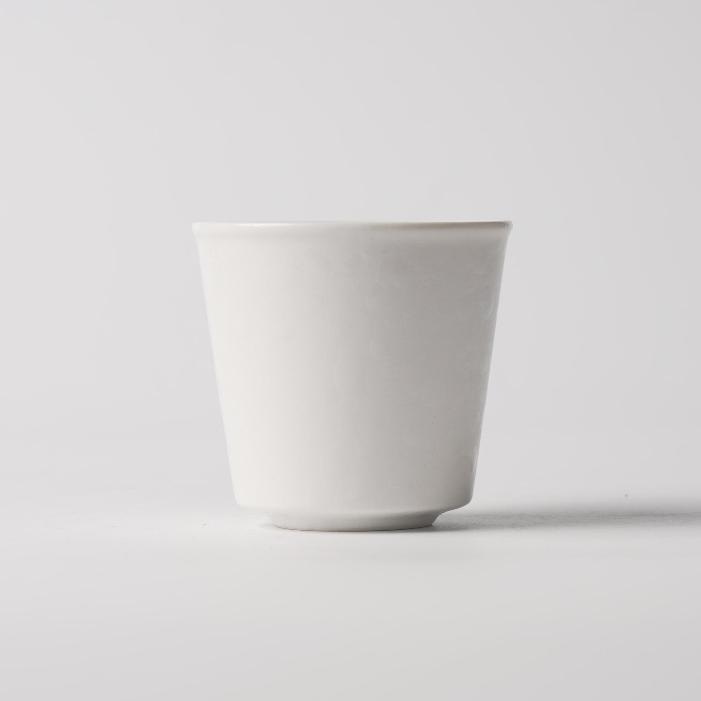 Dot Pearl White Porcelain Handleless Tapered Cup