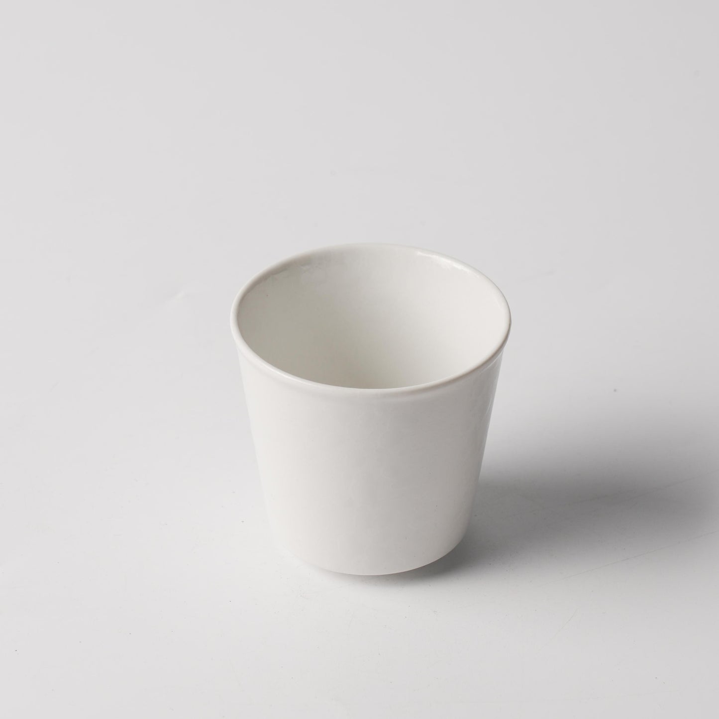 Dot Pearl White Porcelain Handleless Tapered Cup
